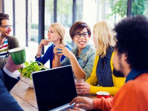 Group Of Friends Having A Coffee Break In A Cafe